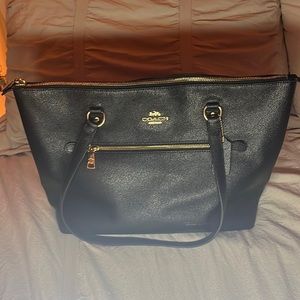 Black coach bag, gold metal